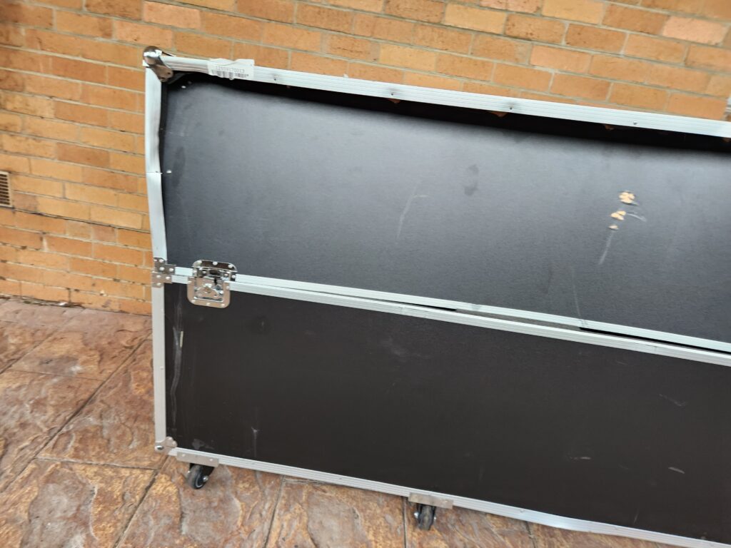 Moving TV box protecting flat screen smart TV during transport.